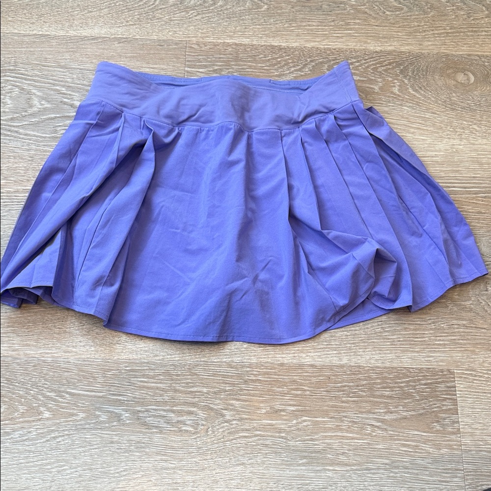 Lululemon side-pleat high-rise tennis skirt, size 8, in charged indigo